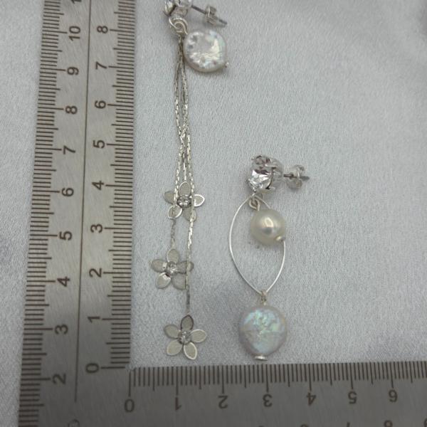 Asymmetrische oorbellen met Swarovski en zoetwater parels