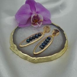 Luxe handgemaakte oorbellen met blauwe zoetwater parels