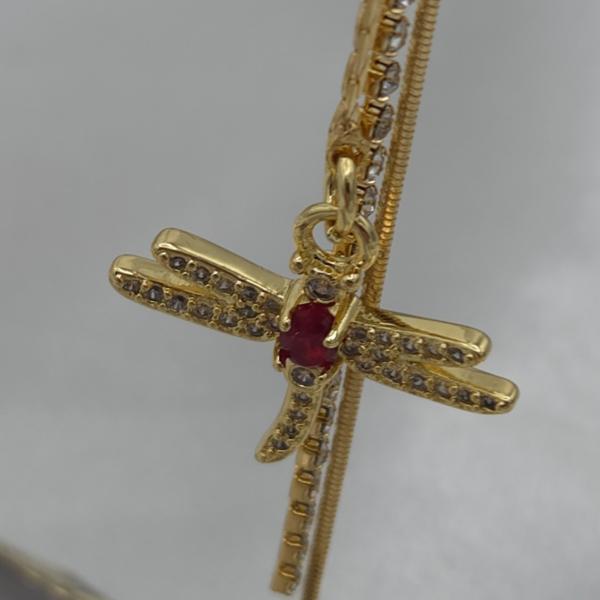 Luxe asymmetrische oorbellen goud en rood